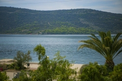 The beach is in front of the house